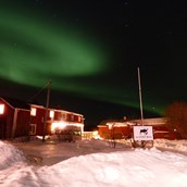 Rollstuhlgerechte Unterkunft: The beautiful Northern Lights over The Friendly Mose - The Friendly Moose Lapland