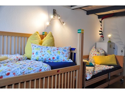 Rollstuhlgerechte Unterkunft - Unterkunftsart: Ferienwohnung - Schlafzimmer II - Fewo Bunte Burg