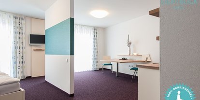 Rollstuhlgerechte Unterkunft - Bayern - Geräumiges Doppelzimmer für Rollstuhlfahrer - 100 % barrierefreies Hotel Lichtblick in Münchner Umgebung