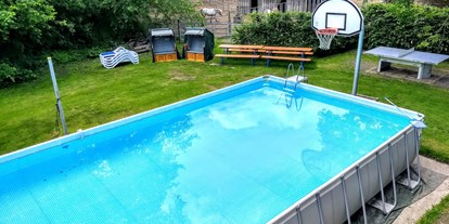 Rollstuhlgerechte Unterkunft - Bayern - Im Sommer Pool 10m x 5m und
im Winter Basketball-Platz  - Erdhausapartment OST