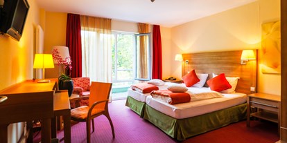 Rollstuhlgerechte Unterkunft - Schwarzwald - Barrierefreies Zimmer mit TV - Nashira Kurpark Hotel****